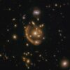 the largest and one of the most complete Einstein rings ever discovered, dubbed the "Molten Ring"