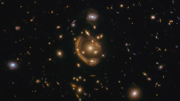 the largest and one of the most complete Einstein rings ever discovered, dubbed the "Molten Ring"