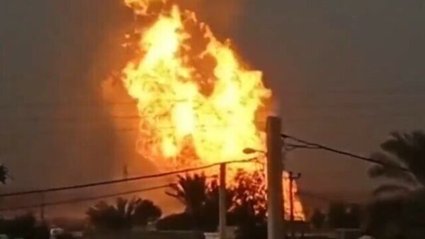 Fire rising from an oil pipeline that exploded in southern Iran