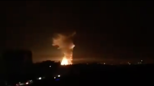 Explosions seen in the Syrian city of Latakia after an attack on a military facility nearby (Screen capture Twitter)
