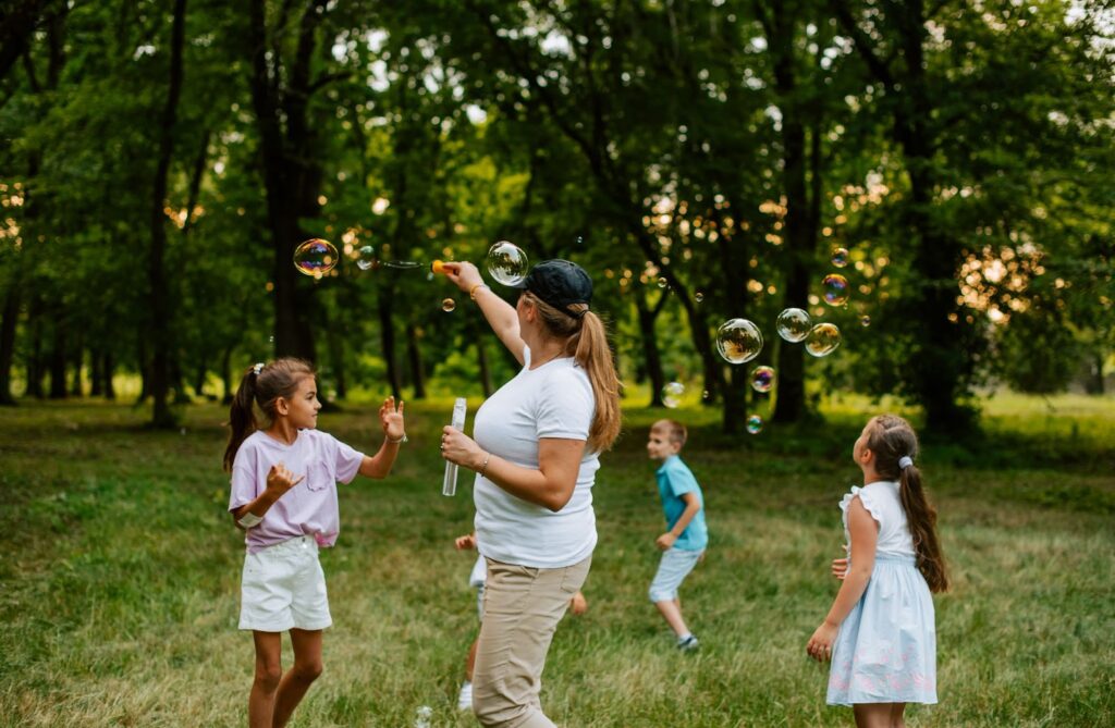 Kids playing at summer camp, similar to Camp Ramah in California, which Janine Winkler Lowy supports through her foundation, The Winkler Lowy Foundation.