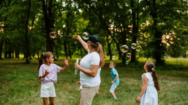 Kids playing at Jewish summer camp, similar to Camp Ramah in California, which Janine Winkler Lowy supports through her foundation, The Winkler Lowy Foundation