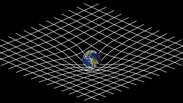 Spacetime -Einstein - Gravity can be thought of as the movements of particles through curved space-time. Credit NASA